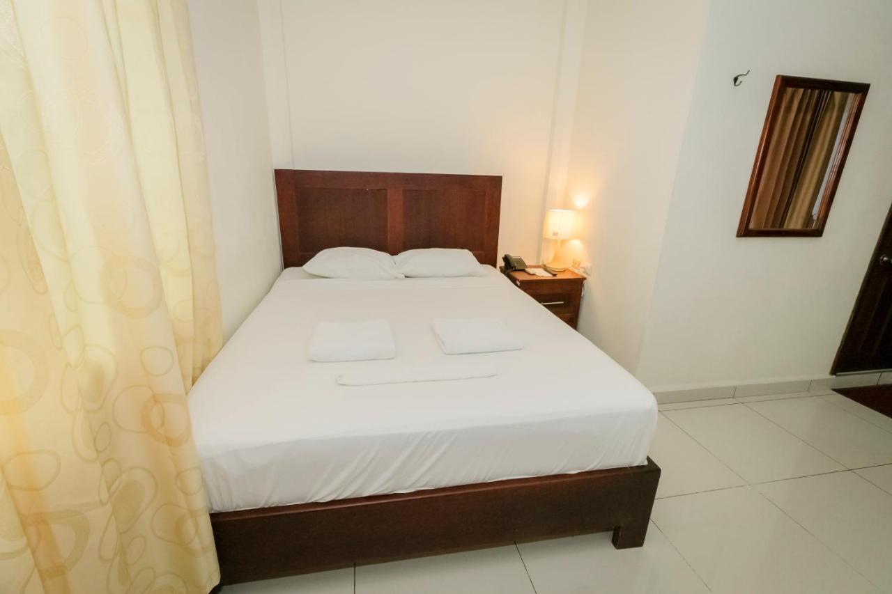 Hotel Mediterraneo Inn Santa Rosa de Lima Buitenkant foto