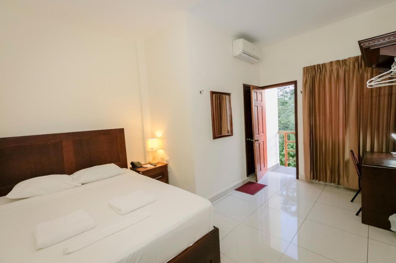 Hotel Mediterraneo Inn Santa Rosa de Lima Buitenkant foto