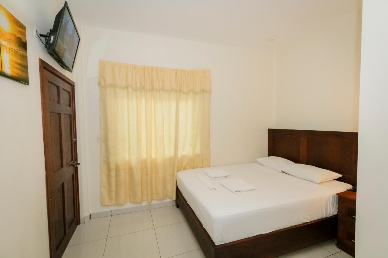 Hotel Mediterraneo Inn Santa Rosa de Lima Buitenkant foto