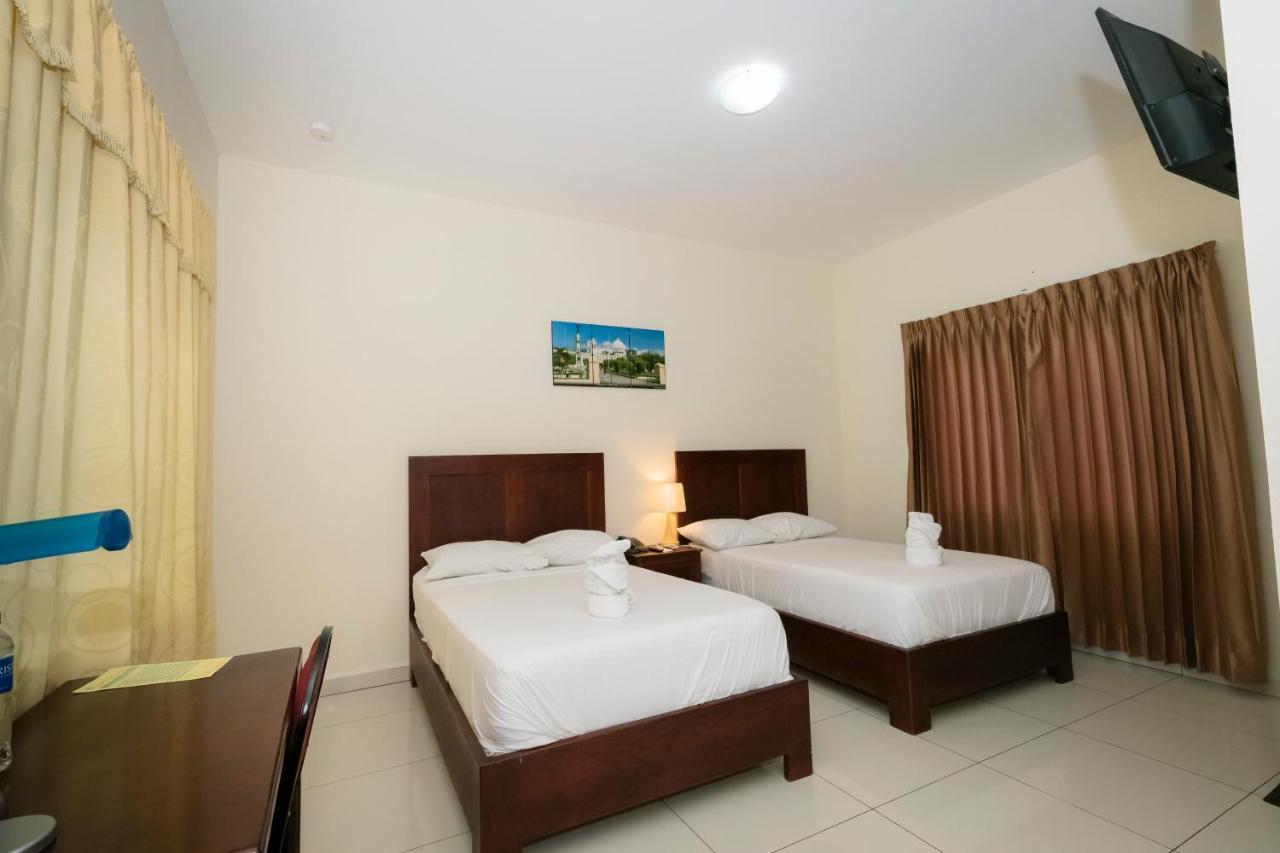 Hotel Mediterraneo Inn Santa Rosa de Lima Buitenkant foto
